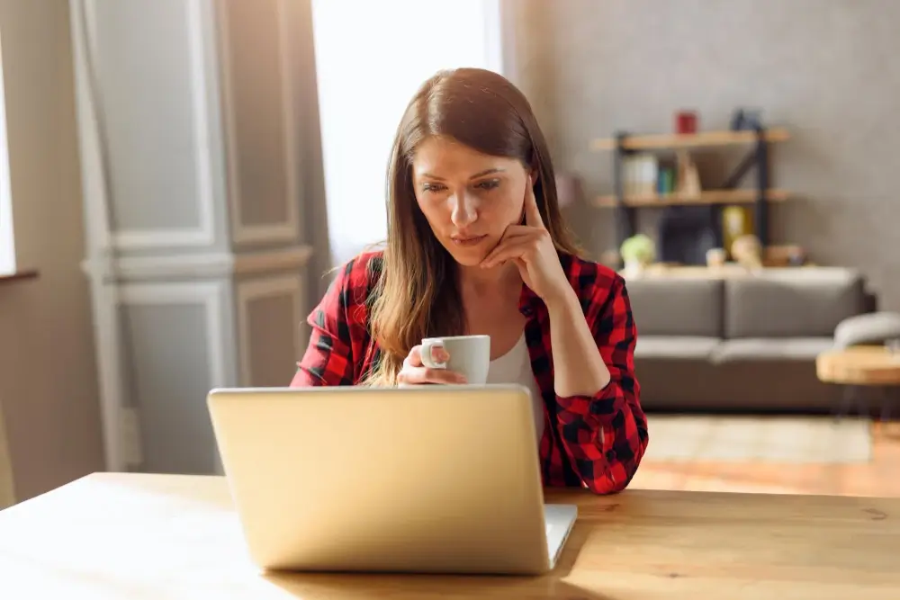 Woman using the removal costs calculator Woman using the removal costs calculator